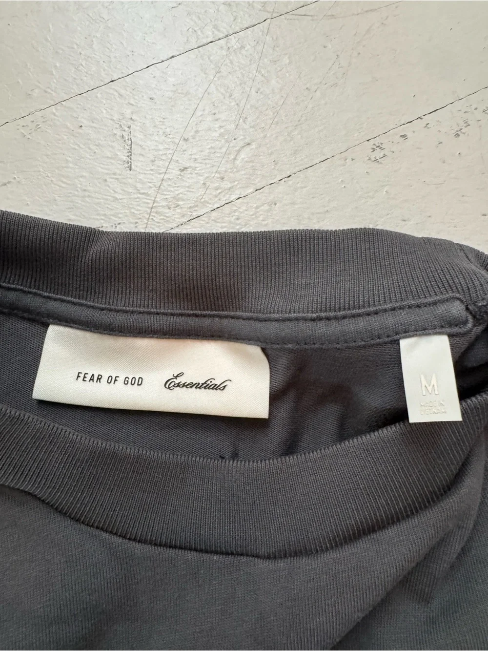 Fear of God Black Tee with White Script Logo